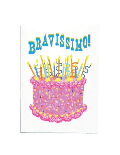A white greeting card featuring a colorful illustration of a birthday cake with candles and the word 'BRAVISSIMO!' in playful blue letters at the top.