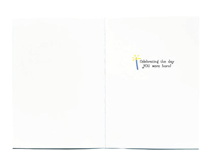 A small printed message on the right page reading 'Celebrating the day YOU were born!' 