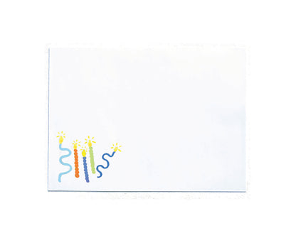 A square white card or envelope with a small colorful illustration in the lower-left corner showing three wavy candle-like shapes in blue, orange, green, and yellow on a white background.